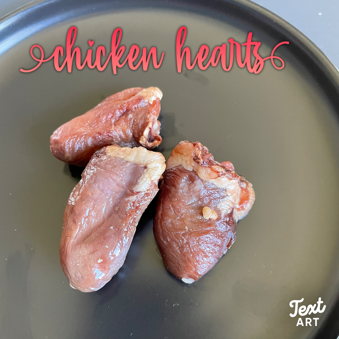 three chicken hearts on a plate